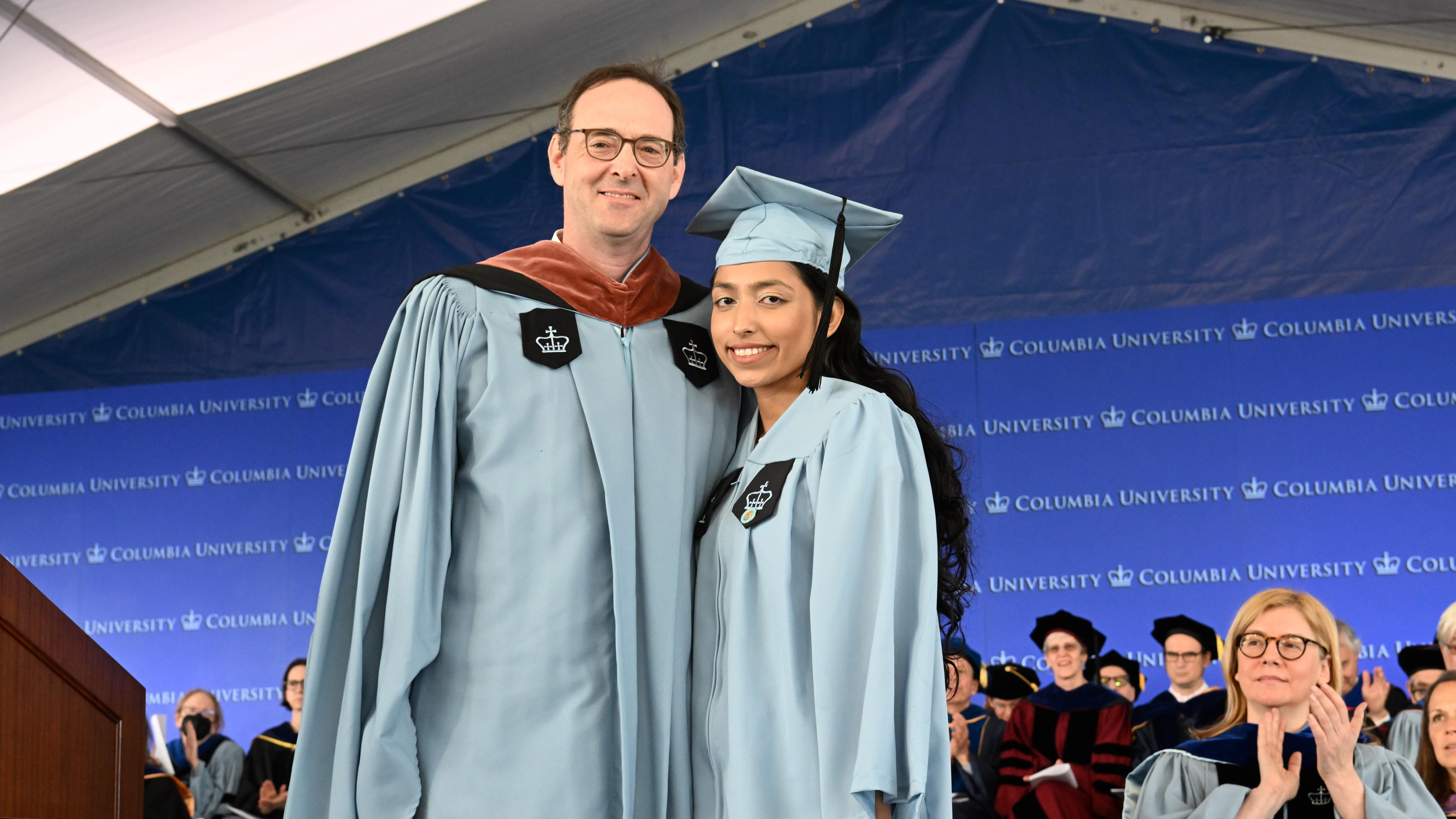 Columbia College Alumni Association chair and former president Doug Wolf CC'88 with 2023 Class Day Student Prize Recipient Sumya Rashid