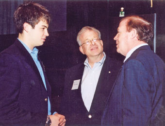 Dean Austin Quigley right chats with two attendees at last year’s Dean’s Day.