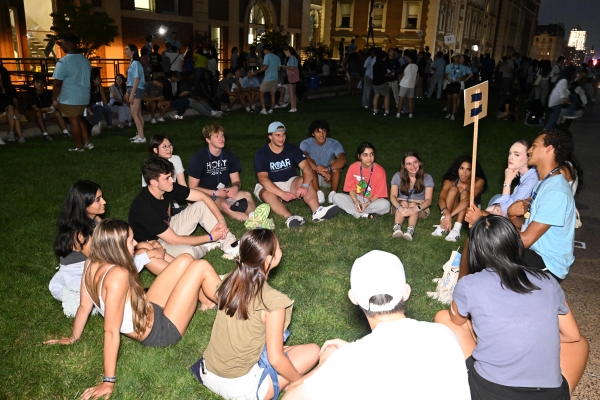 Incoming students sit in their orientation group