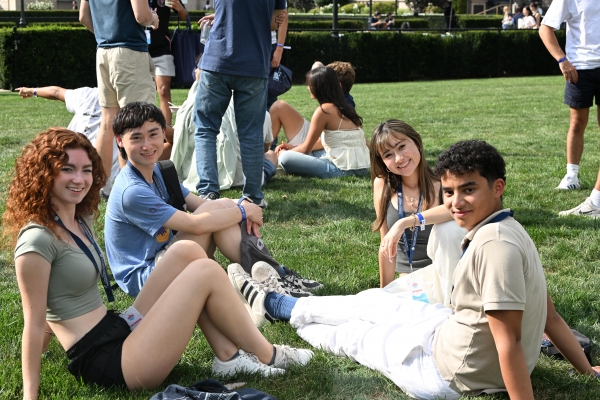 Incoming students mingle on the lawns.